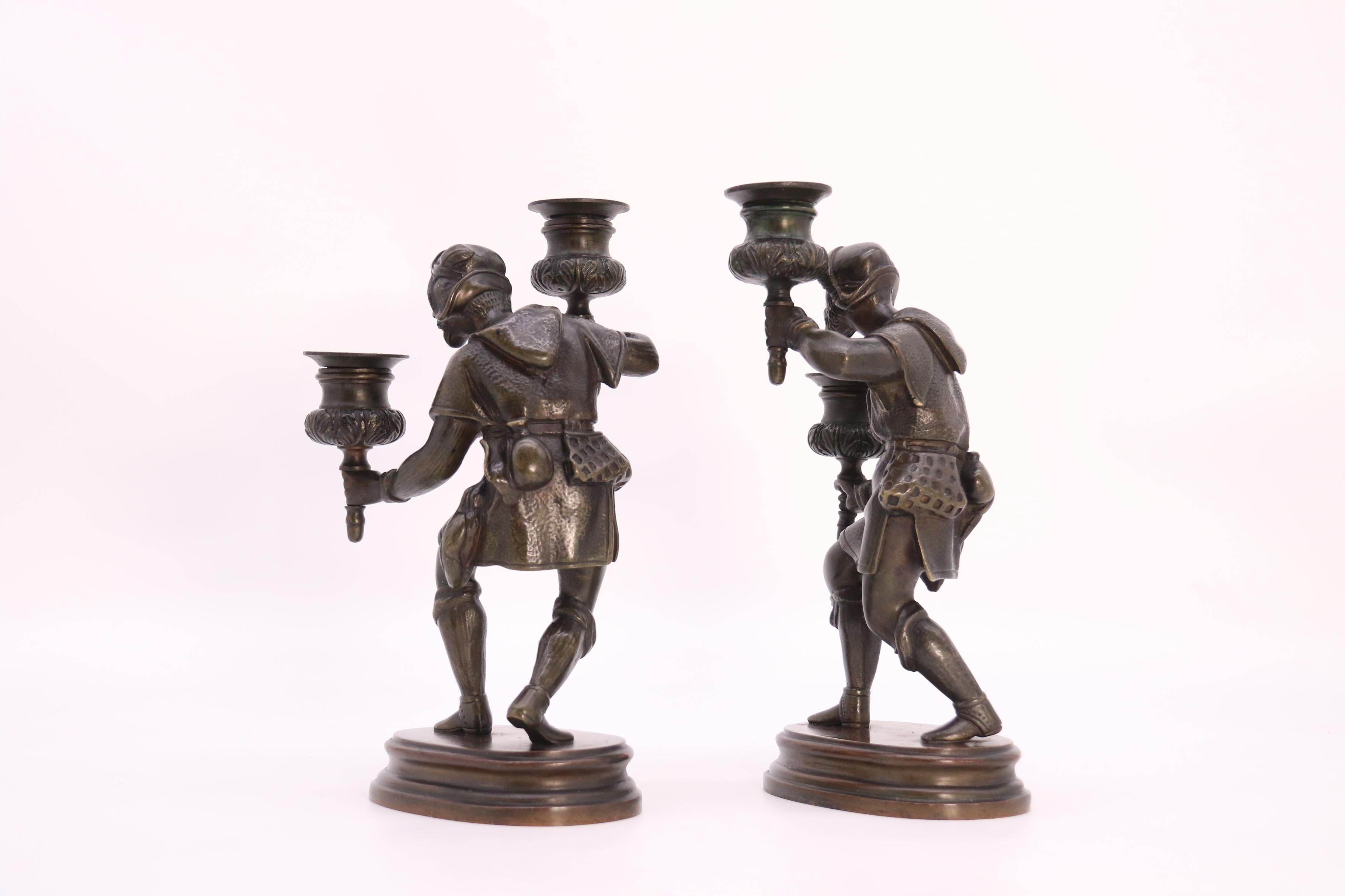 A pair of French 19th century bronze figurative double candlesticks circa 1860 For Sale 1