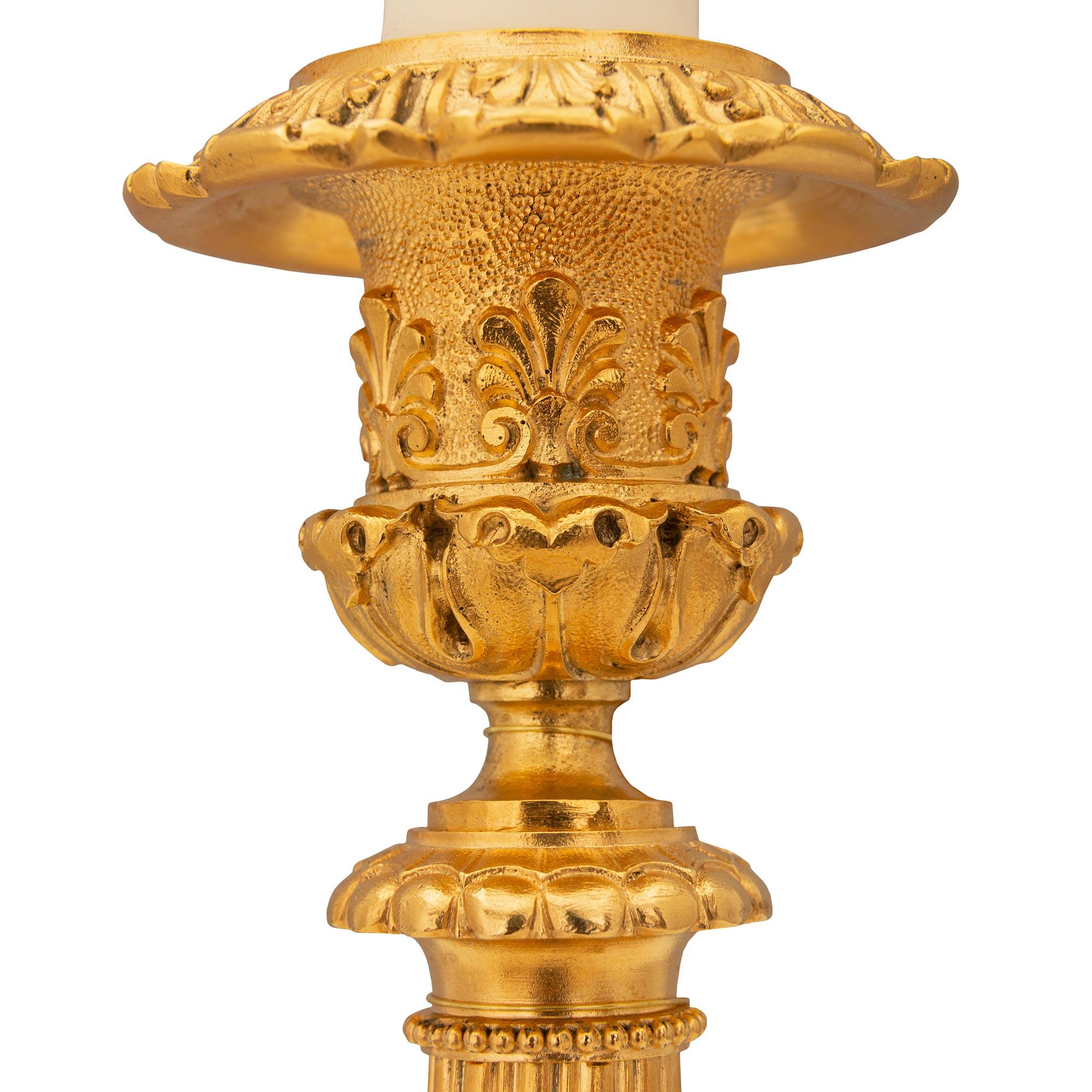 Pair of French 19th Century Charles X St. Ormolu Candlestick Lamps For Sale 1