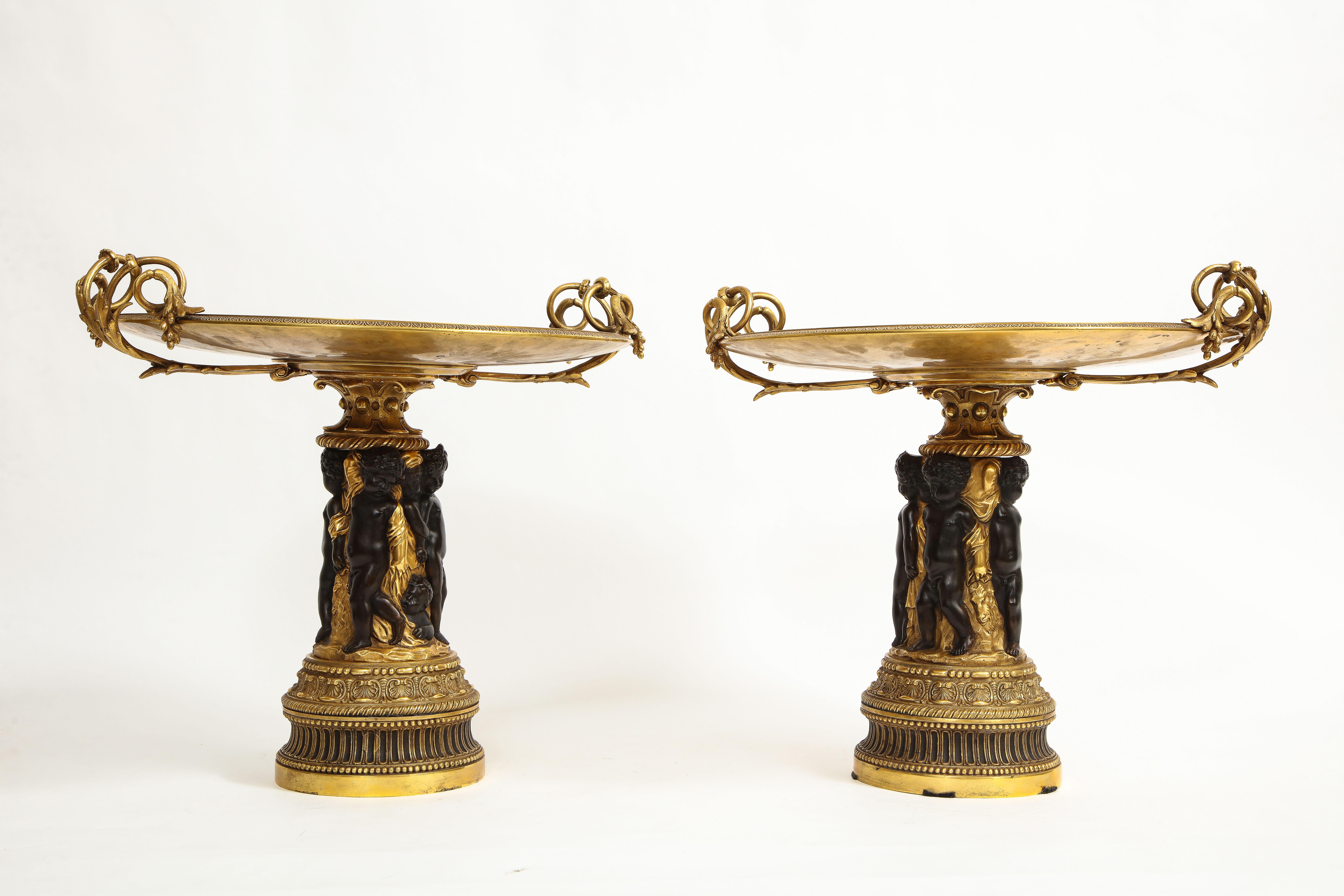 Napoleon III Pair of French 19th Century Dore and Patinated Bronze Handled Tazzas w/ Putti For Sale