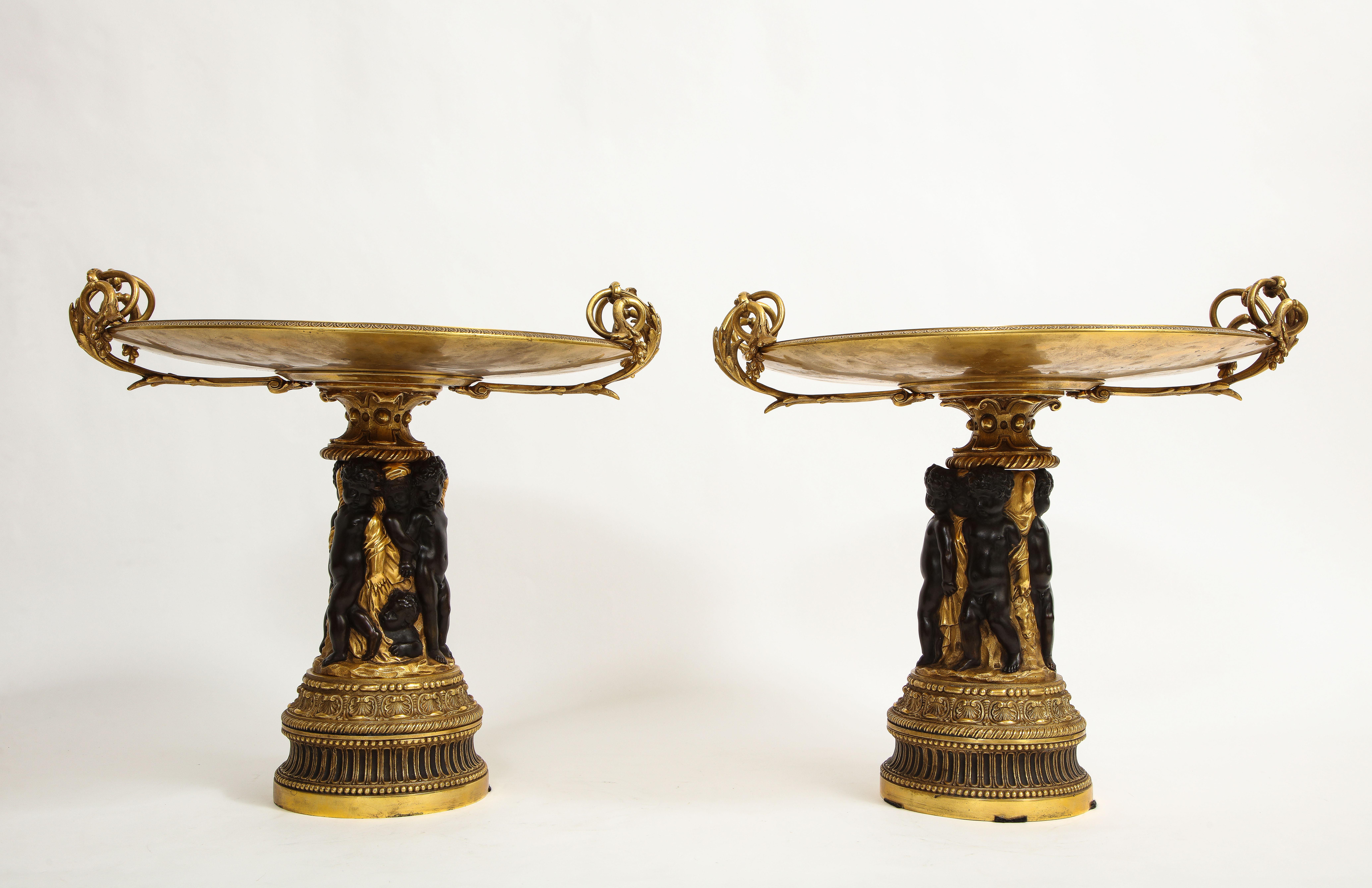 Gilt Pair of French 19th Century Dore and Patinated Bronze Handled Tazzas w/ Putti For Sale