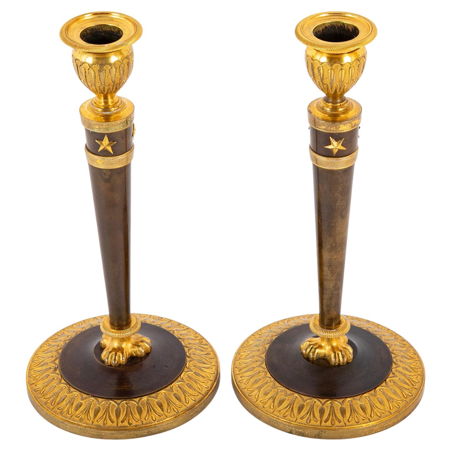 A Pair of French 19th Century Empire Candlesticks For Sale