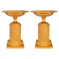 Paire de tazza en bronze doré de style Empire du XIXe siècle