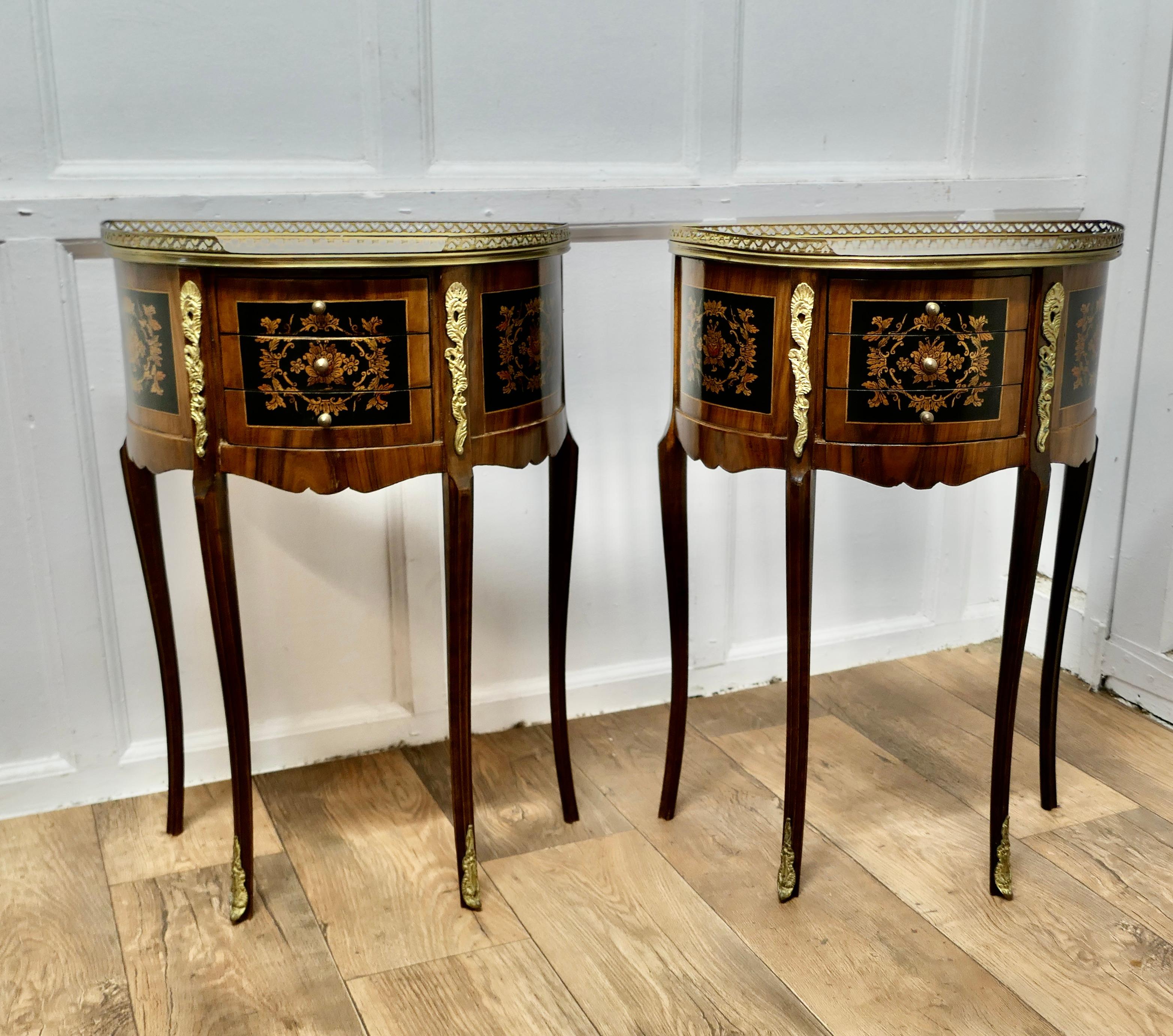 A Pair of French 19th Century Leaf Design Small Side Tables or Bedside Cabinets  

This is a superb quality pair of French 19th Century Demi lune tables, they have a pierced brass gallery around the top and they each have 3 small drawers to the