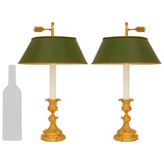 A pair of French 19th century Louis XV st. Ormolu and Tole Bouillotte lamps