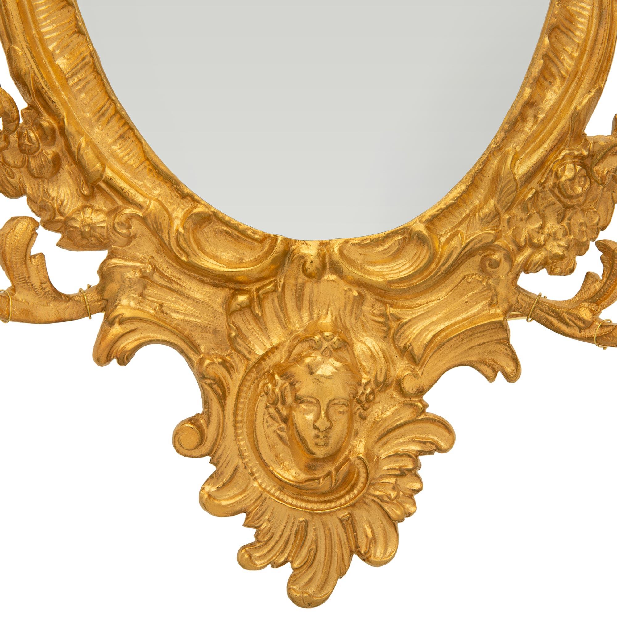 A pair of French 19th century Louis XV st. Ormolu mirrored sconces For Sale 3