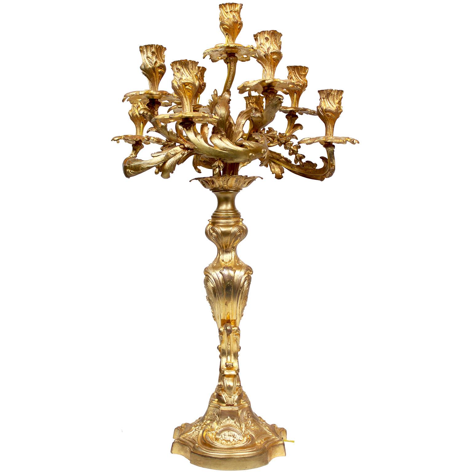 Ormolu A Pair of French 19th Century Louis XV Style Gilt-Bronze Nine-Light Candelabra For Sale