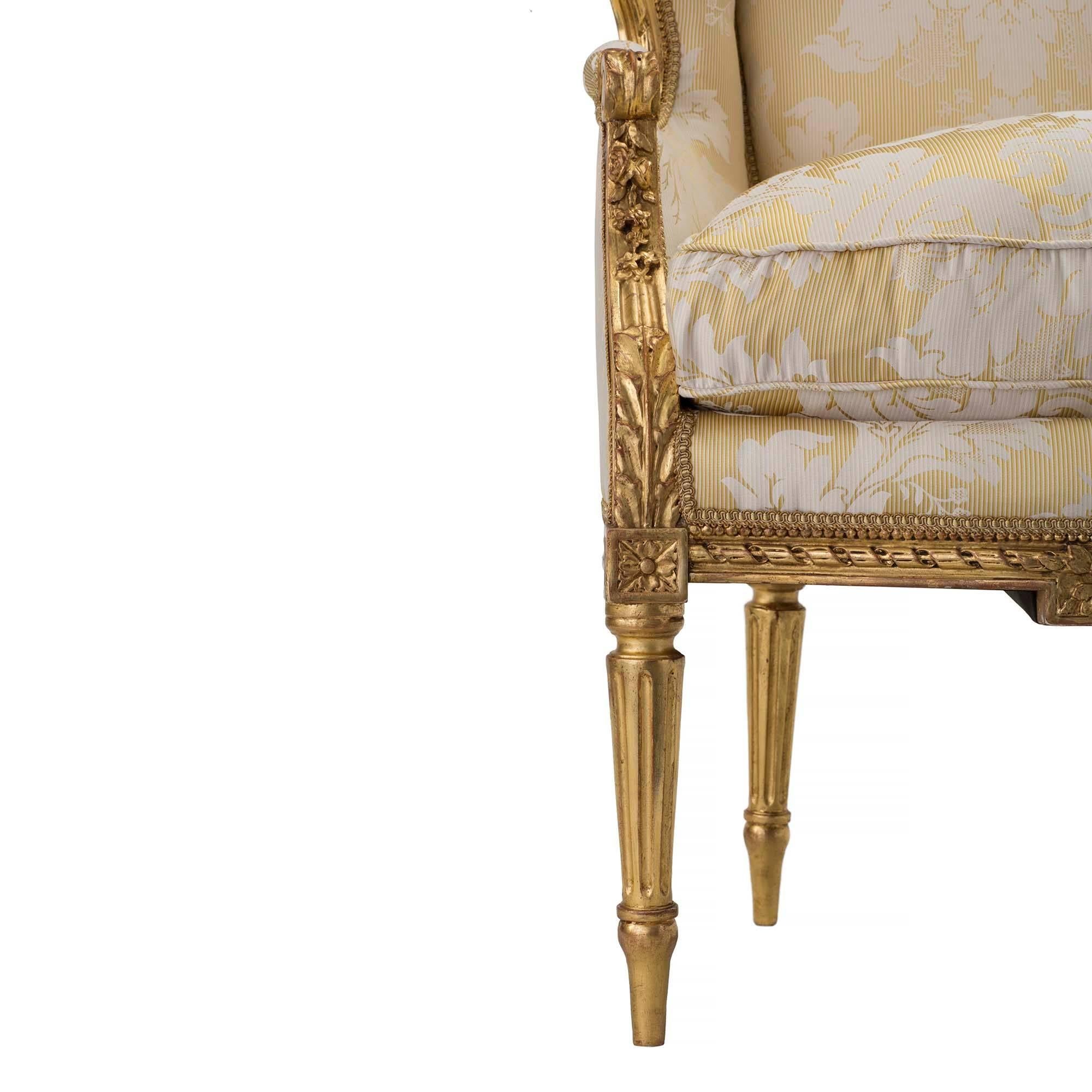 Pair of French 19th Century Louis XVI Style Giltwood Bergères In Excellent Condition In West Palm Beach, FL