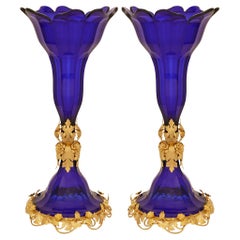 A pair of French 19th century Louis XVI st. Glass and Ormolu vases