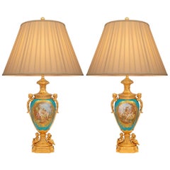 A Pair Of French 19th Century Louis XVI St. Ormolu And Sèvres Porcelain Lamps