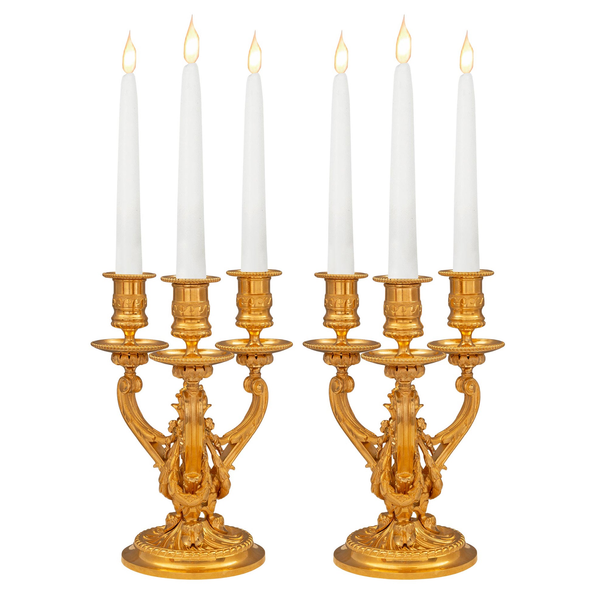 A Pair Of French 19th Century Louis XVI St. Ormolu Candelabras