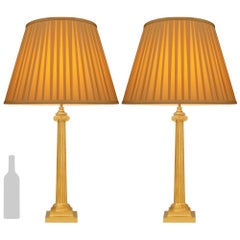 A pair of French 19th century Louis XVI st. Ormolu lamps