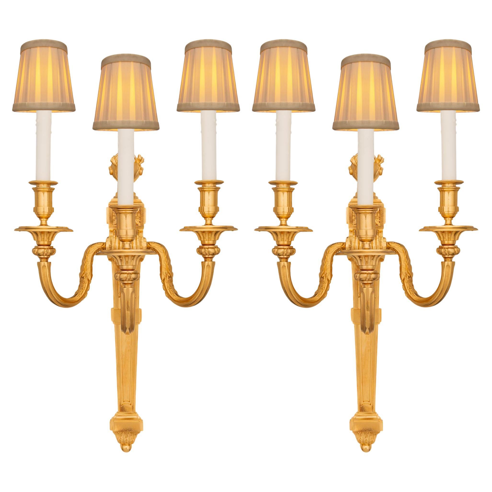 A pair of French 19th century Louis XVI st. Ormolu sconces