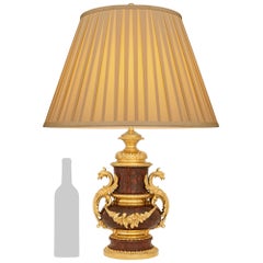 Paire de lampes en marbre Rouge Griotte et bronze doré de style Louis XVI du 19ème siècle. Lampe en marbre Rouge Griotte et bronze doré