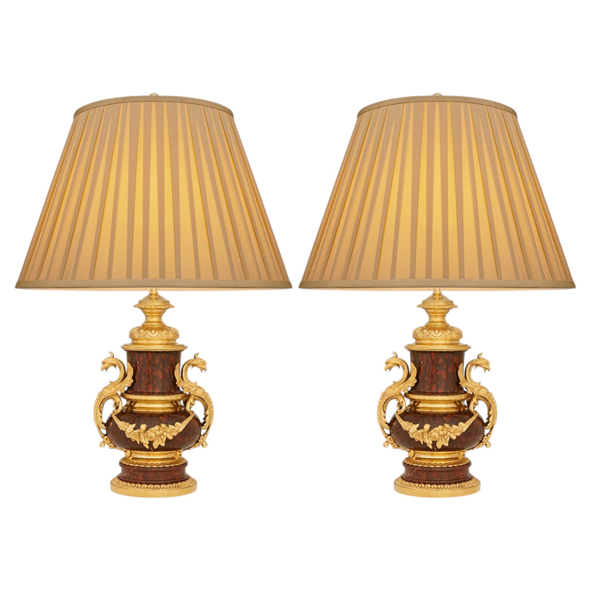 A pair of French 19th century Louis XVI st. Rouge Griotte marble and Ormolu lamp