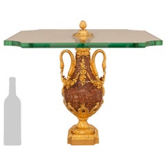 A pair of French 19th century Louis XVI st. Rouge Griotte marble