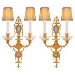 A pair of French 19th century Neo-Classical st. Ormolu, Wedgwood sconces