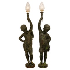 A pair of French 19th century Neo-Classical st Verdigris Bronze and Ormolu lamps