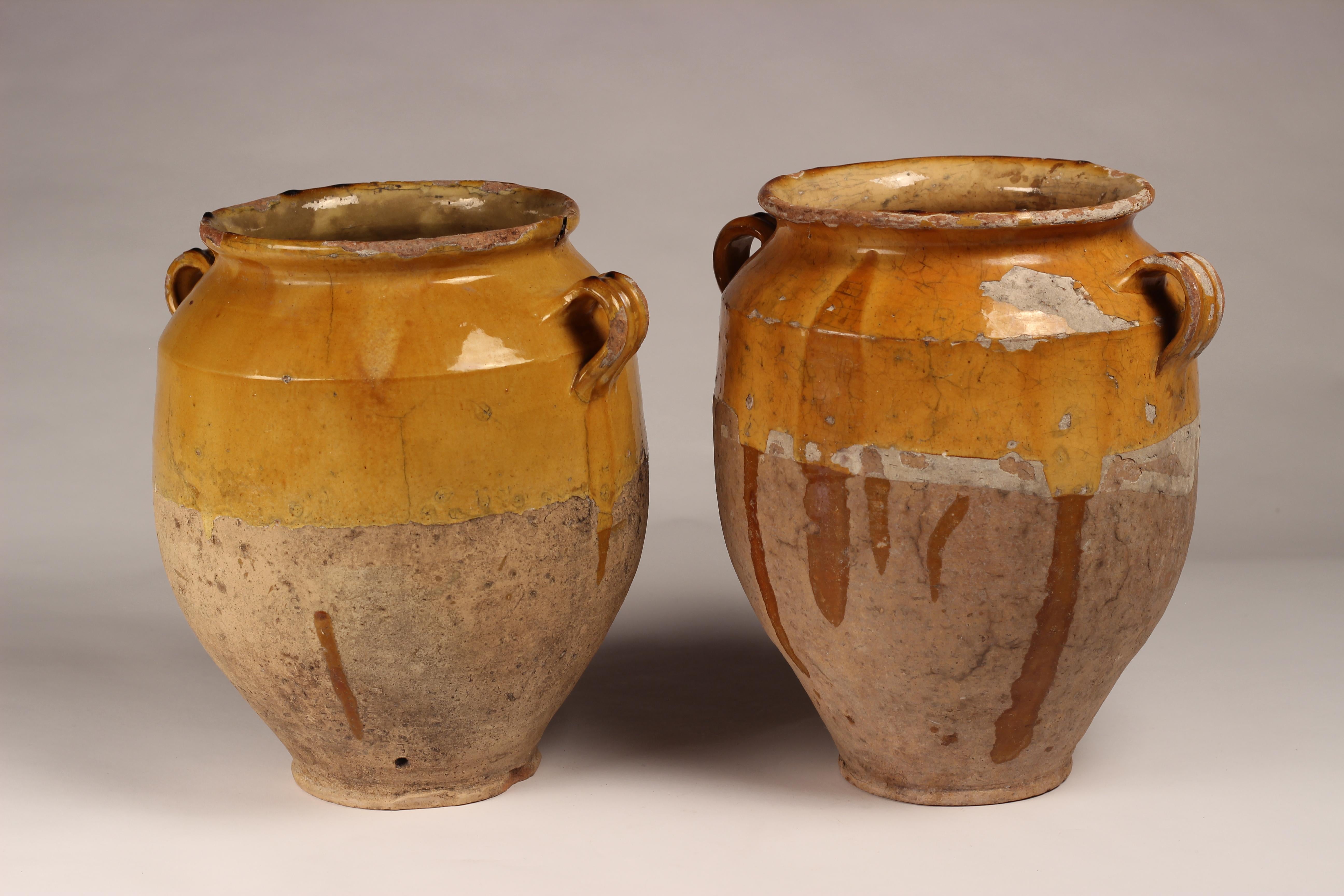 Antique French glazed terracotta confits pot in very nice original condition. These pots were used primarily in the South of France for the preservation of meats such as duck or goose for dishes like cassoulet or foie gras. The bottom halves were