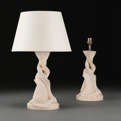 A Pair of French 20th Century Bisque Fired Pottery Dolphin Lamps