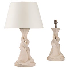 A Pair of French 20th Century Bisque Fired Pottery Dolphin Lamps