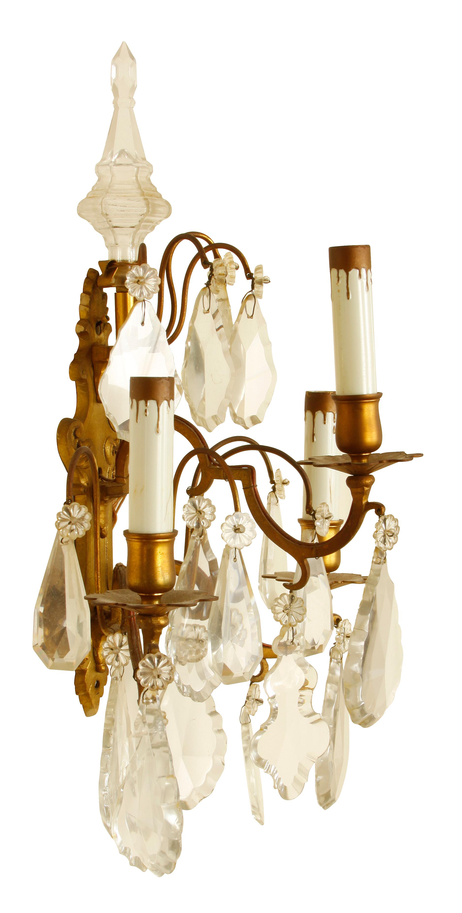 A pair of French 3-light bronze and crystal sconces.