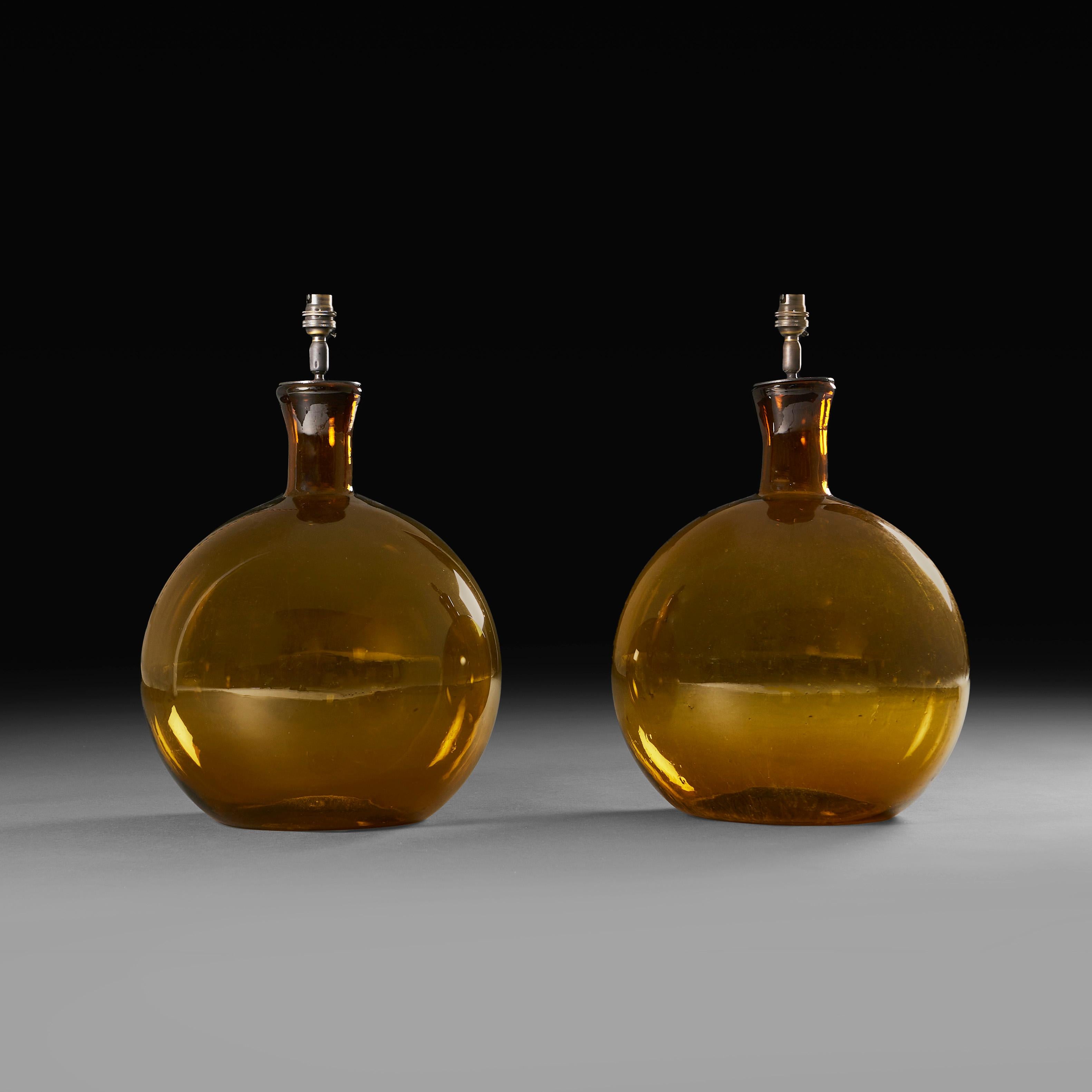 20th Century A Pair of French Amber Glass Vessels as Table Lamps For Sale