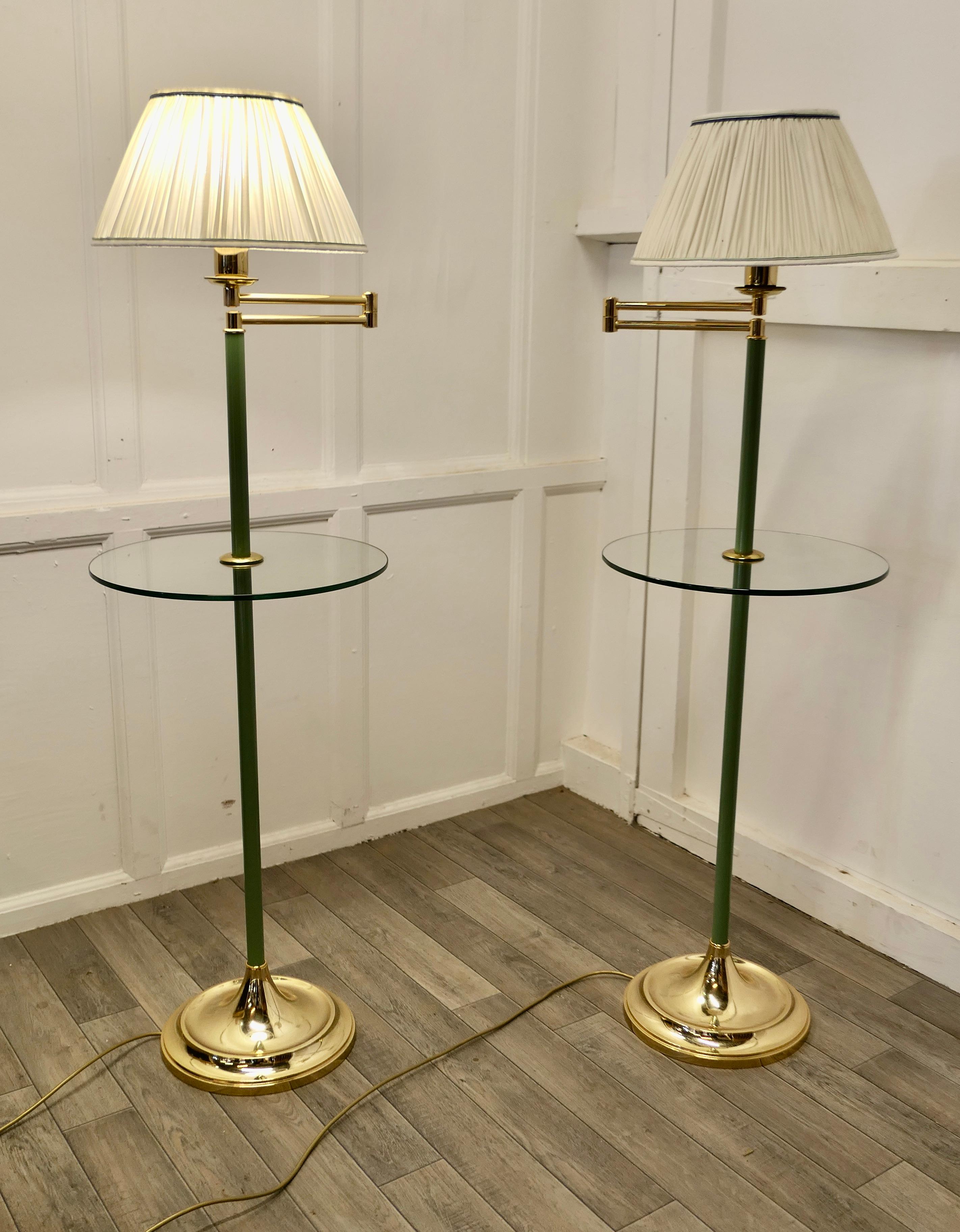 A Pair of French Art Deco adjustable swing arm floor lamps, reading Lamps

These are beautifully designed pieces, the lamps have a heavy brass base which supports a green column with an adjustable Swing Arm on a full height column, this can be