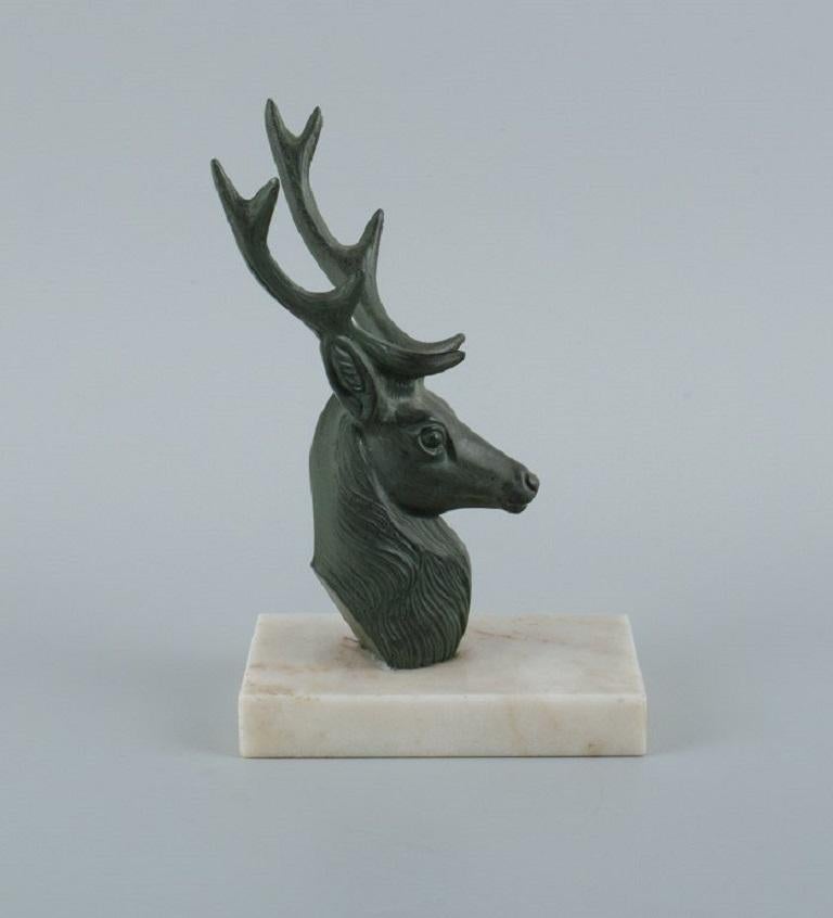 Pair of French Art Deco Bookends. Stags in Patinated Metal on a Marble Base In Excellent Condition For Sale In Copenhagen, DK