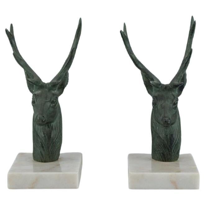 Pair of French Art Deco Bookends. Stags in Patinated Metal on a Marble Base For Sale