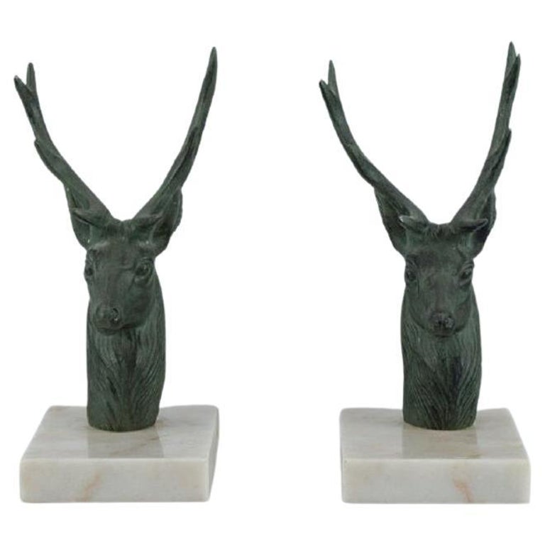 Pair of French Art Deco Bookends. Stags in Patinated Metal on a Marble