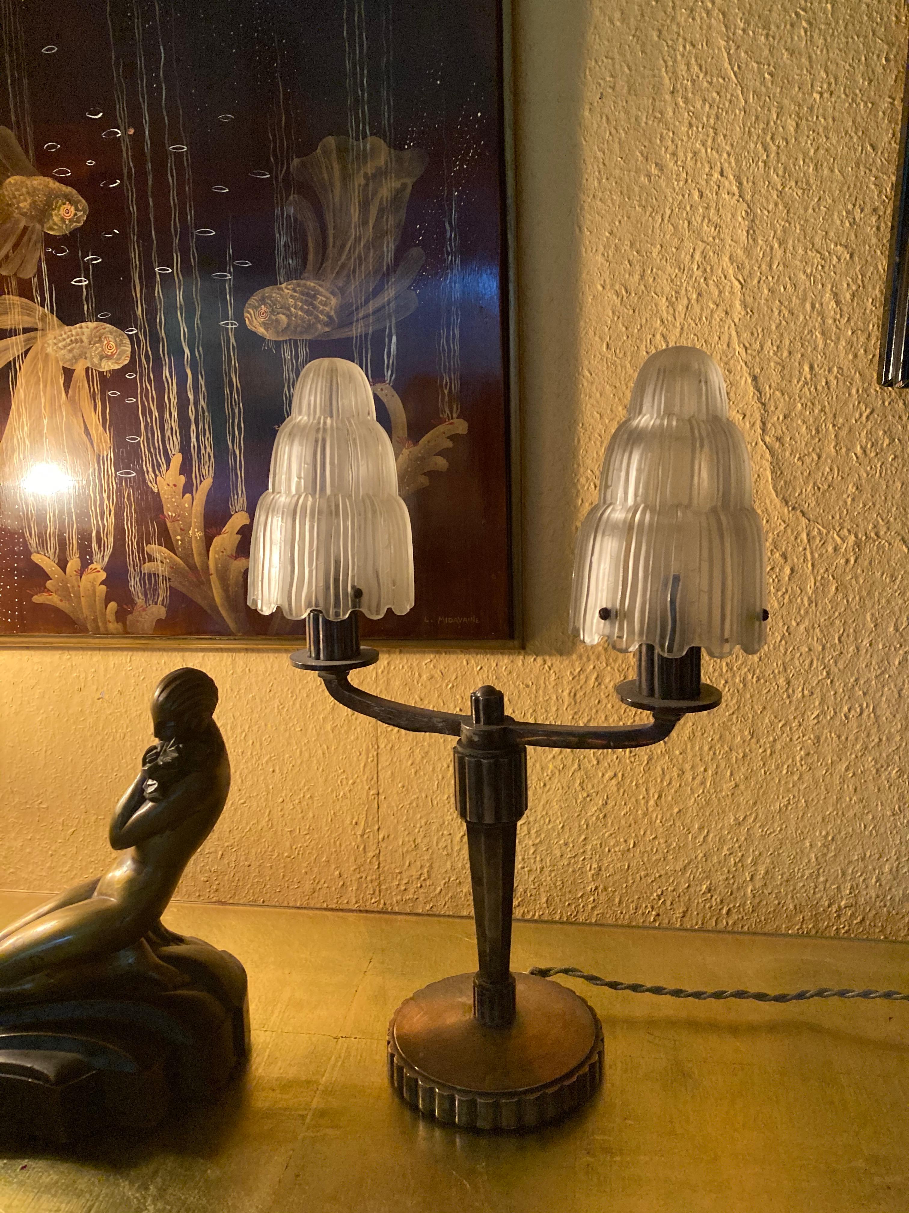 1 Pair of French two-light Art Deco table lamps by Marius Ernest Sabino. Model 