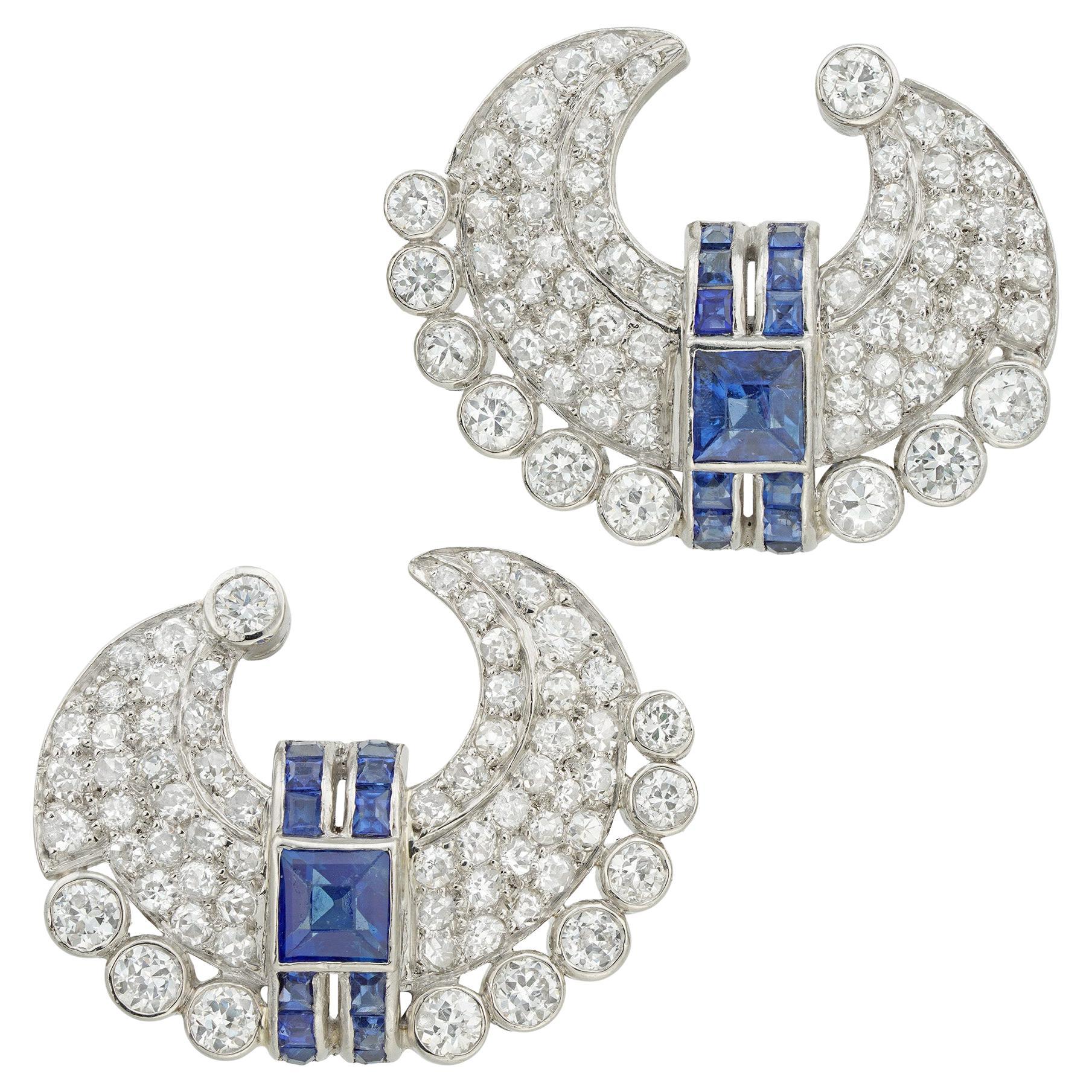A pair of French Art Deco diamond and sapphire crescent earrings