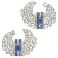 A pair of French Art Deco diamond and sapphire crescent earrings