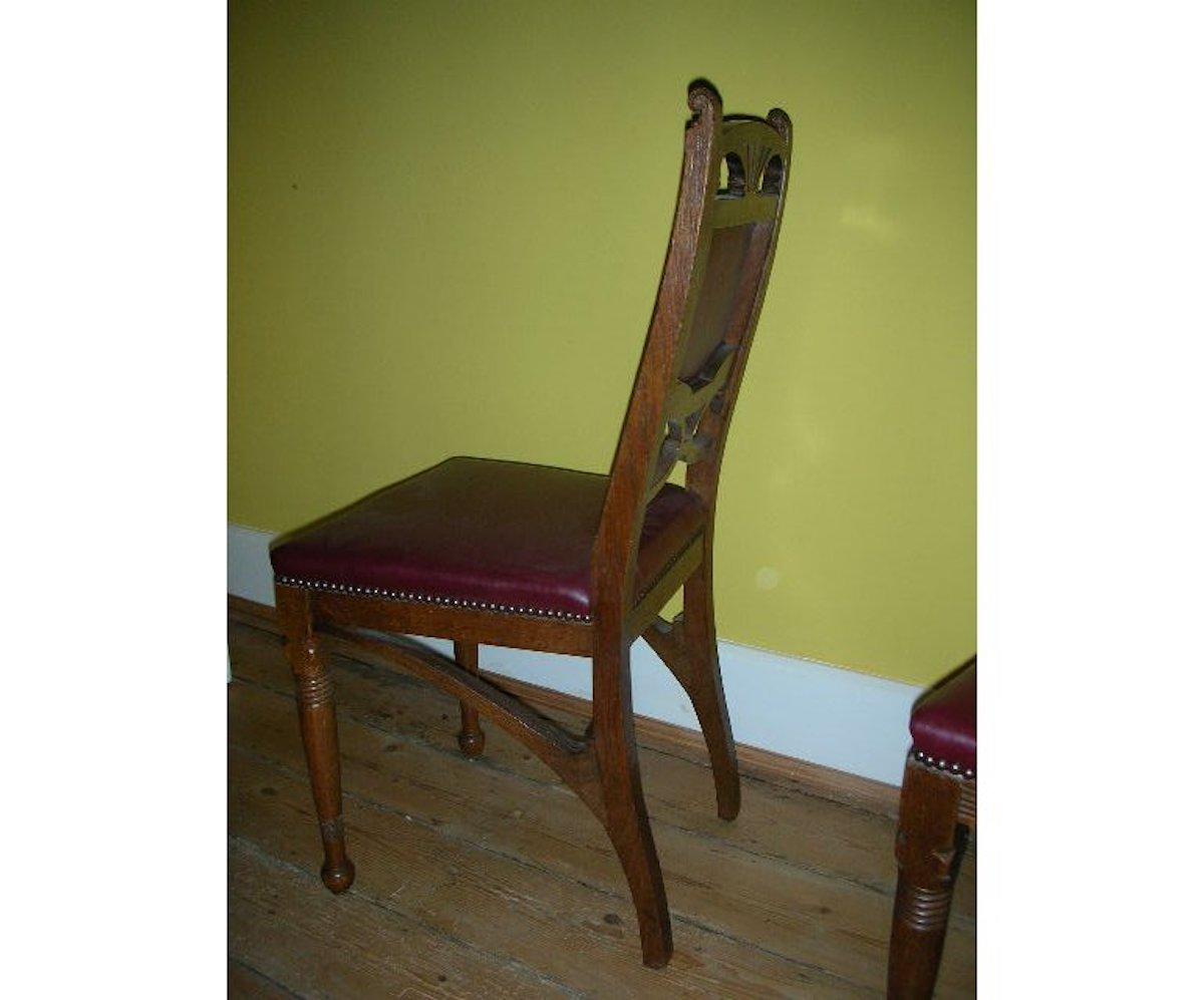 Hand-Crafted Pair of French Art Nouveau Oak Dining Chairs with Whiplash Side Stretchers For Sale
