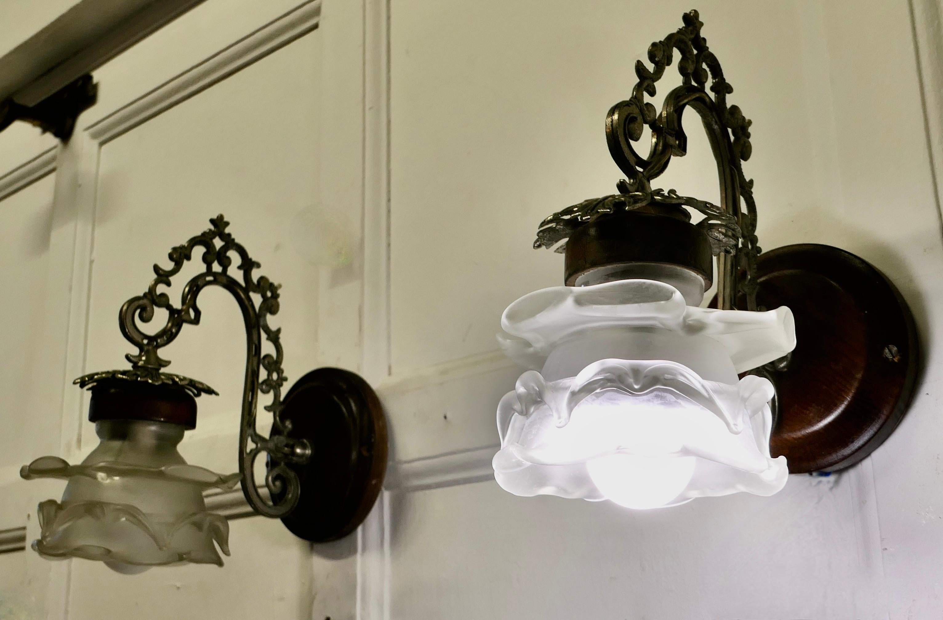 Early 20th Century A Pair of French Arts and Crafts Wall Lights with Flower Shades    For Sale