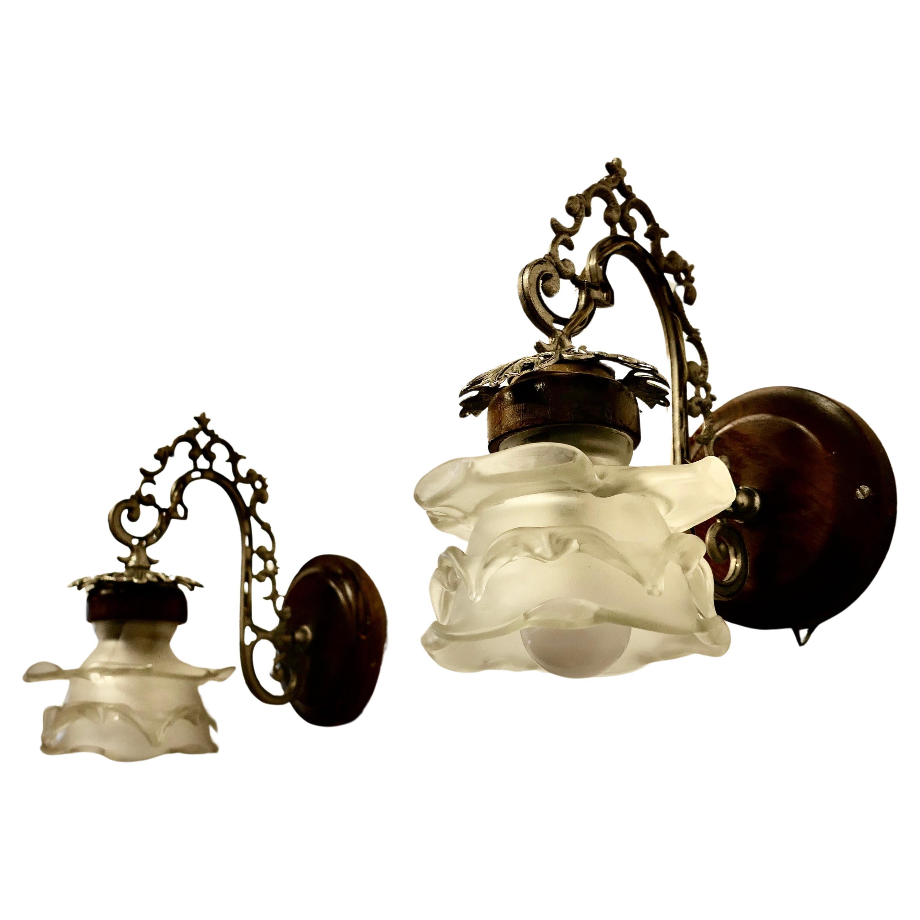 A Pair of French Arts and Crafts Wall Lights with Flower Shades    For Sale