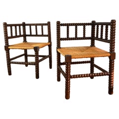 A pair of French Bobbin Corner chairs