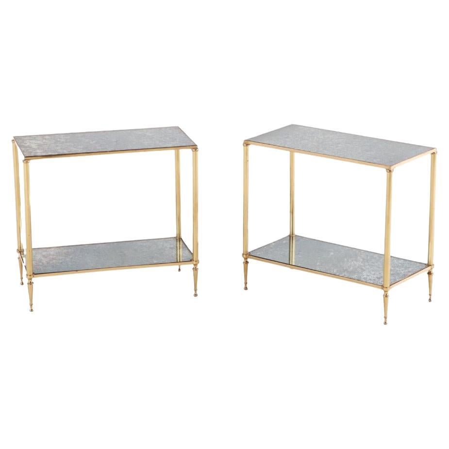 A pair of French brass and mirror end tables in the manner of Jansen C 1950