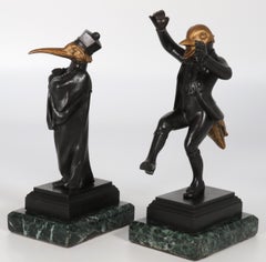A pair of  French bronze caricature figures of theatrical birds, circa 1880