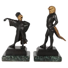 A  pair of French bronze caricature figures of theatrical birds, circa 1880