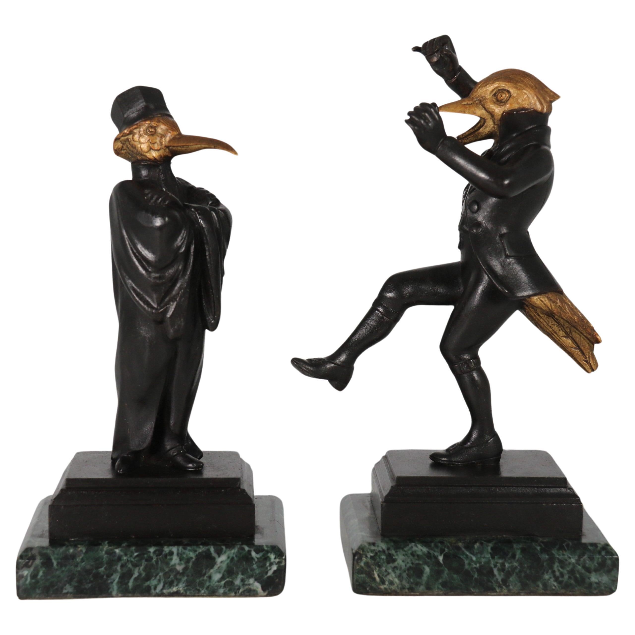 A pair of  French bronze caricature figures of theatrical birds, circa 1880 For Sale
