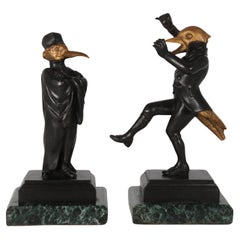 A pair of  French bronze caricature figures of theatrical birds, circa 1880