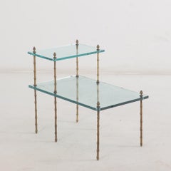 A Pair of French bronze faux bamboo end tables in the manner of Jansen, C 1950.