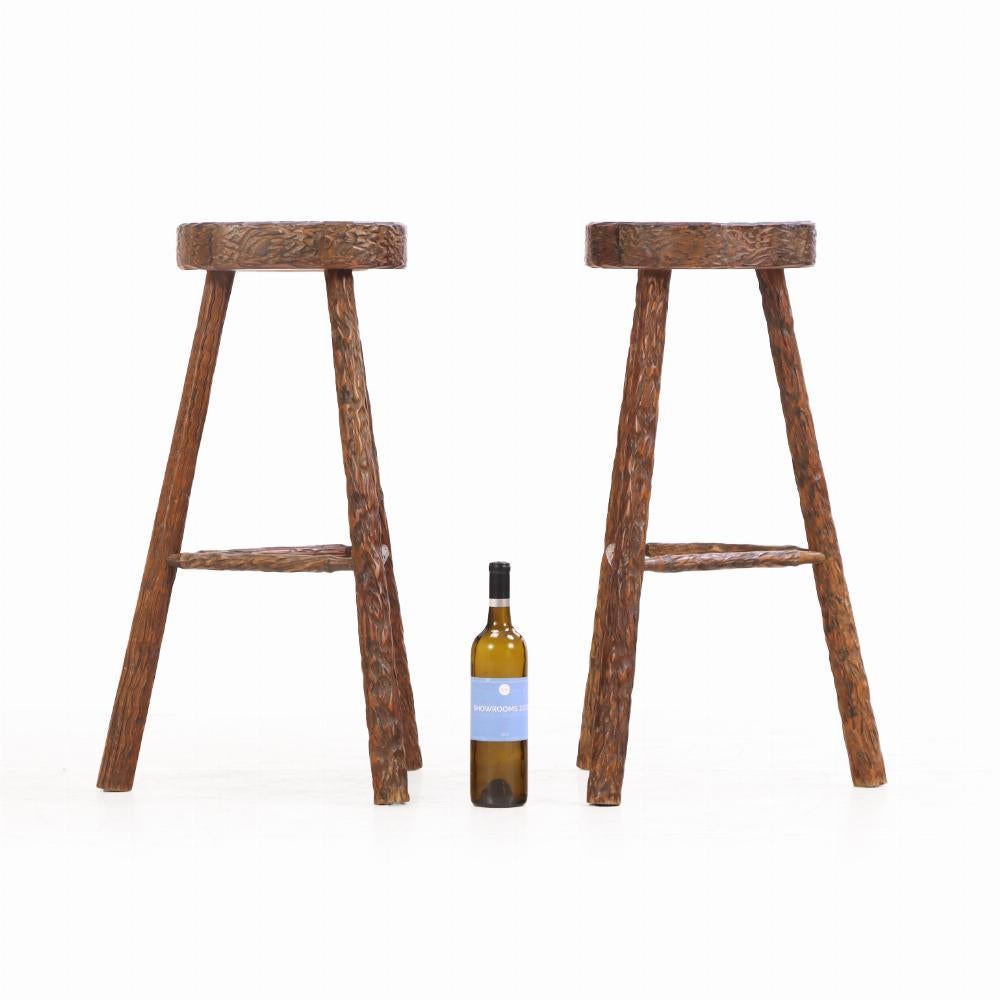 20th Century A Pair of French Brutalist style Gouge-Carved Bar Stools, C. 1960. For Sale