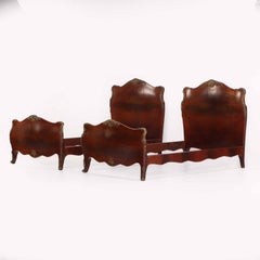 A Pair of French Burl Walnut Bombé Form Twin Beds, C. 1930.