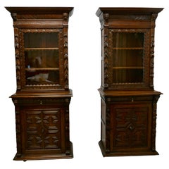 A Pair of French Carved Gothic Oak Bookcases   