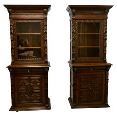 A Pair of French Carved Gothic Oak Bookcases