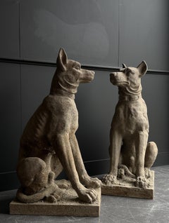 A pair of French cast iron dog statues