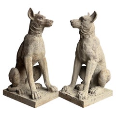 A pair of French cast iron dog statues