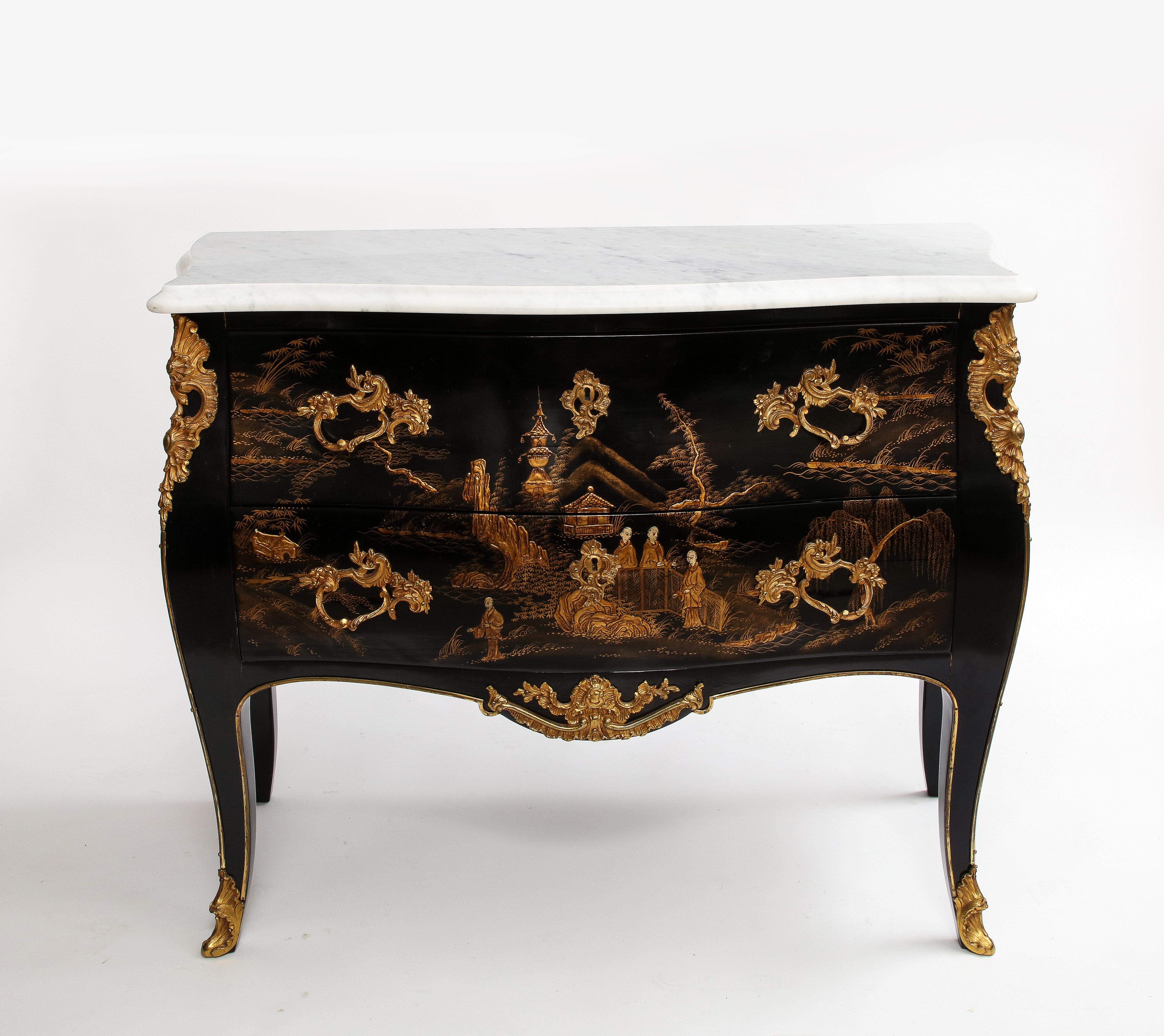 A Fine and Rare Pair of French Chinoiserie Lacquered & Gilt Marble Top 2-Drawer Commodes, Attributed to Jansen.  These exquisite pieces showcase a scalloped predominantly white variegated marble top and two stacked drawers, adorned with meticulously